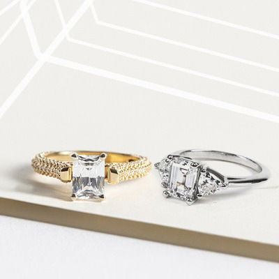 radiant and emerald cut diamond rings