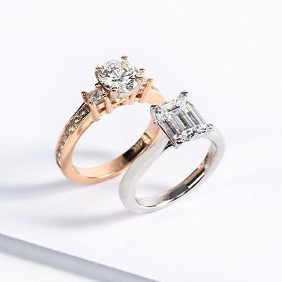 two engagement rings side by side